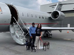 Caroline and Guillermo and pups on a private charter