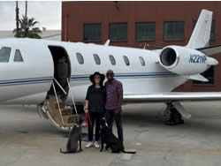 Moho and Phoenix on on a private jet charter