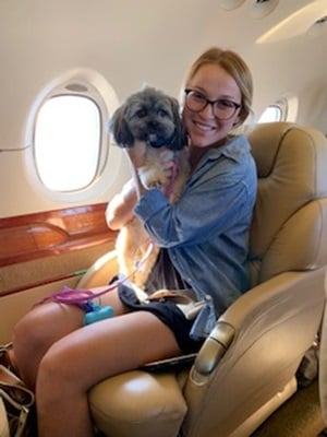 Pet and owner on private jet charter
